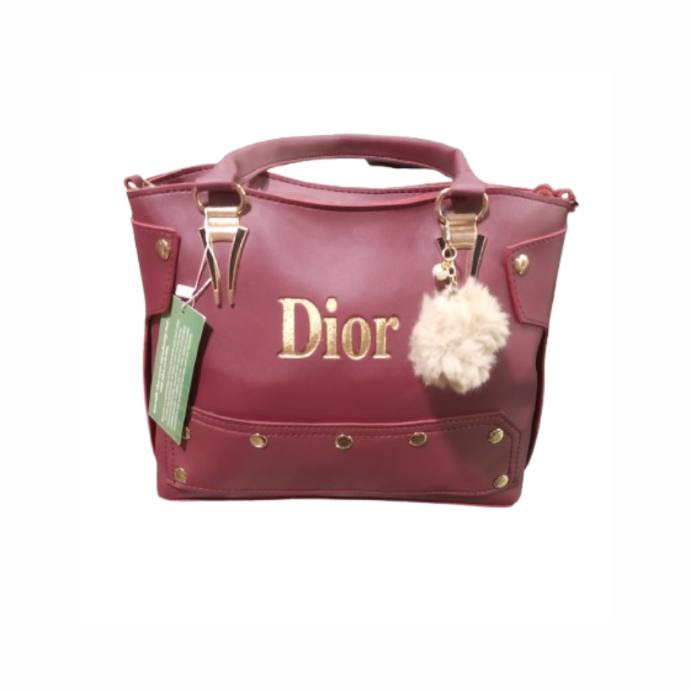 Dior Rose Gold Handbag with Pom-Pom Charm